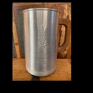 Vintage Pitcher with Wooden Handle.